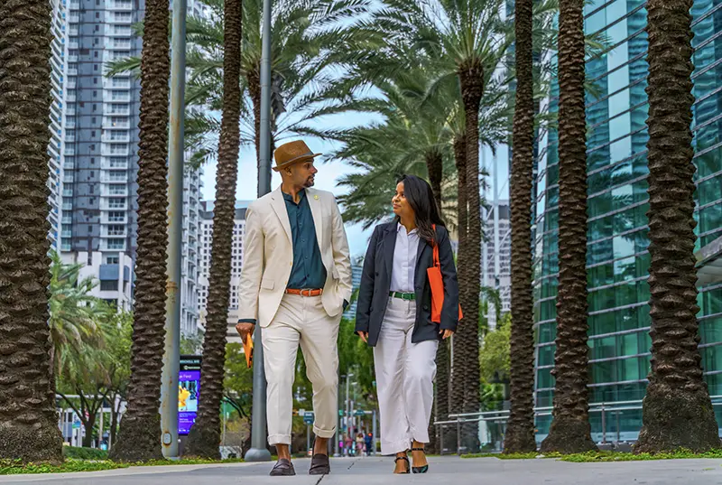 Man and woman taking a stroll downtown